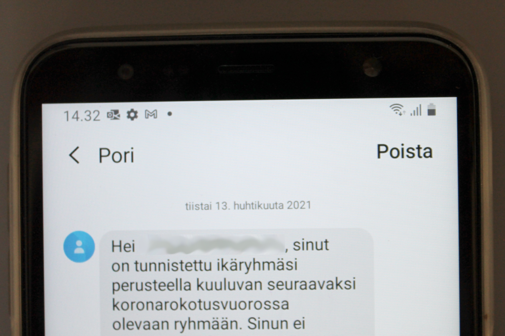 kuvassa koronarokotuksen ajanvarauksen tekstiviesti
