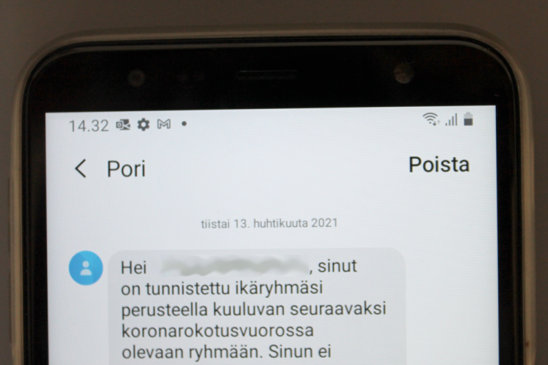 kuvassa koronarokotuksen ajanvarauksen tekstiviesti