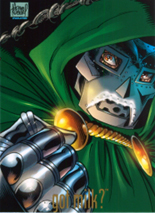 In the picture there is a closeup drawing of Dr. Doom showing off his fist. He is wearing a green cloak and has a metallic mask on.